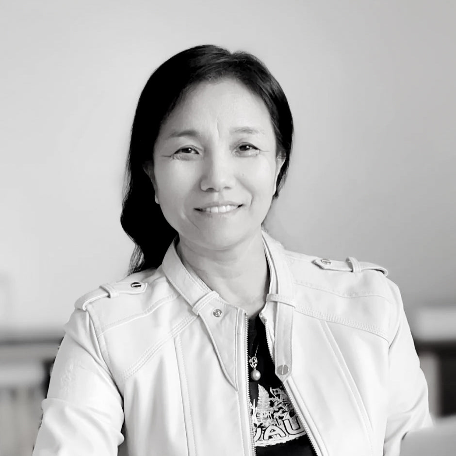 Photograph of Mei Dong, Chief of Product Development.